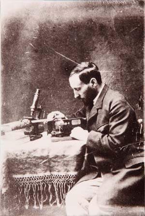 Santiago Ramón y Cajal portrait managing the microtome, 1884-1887