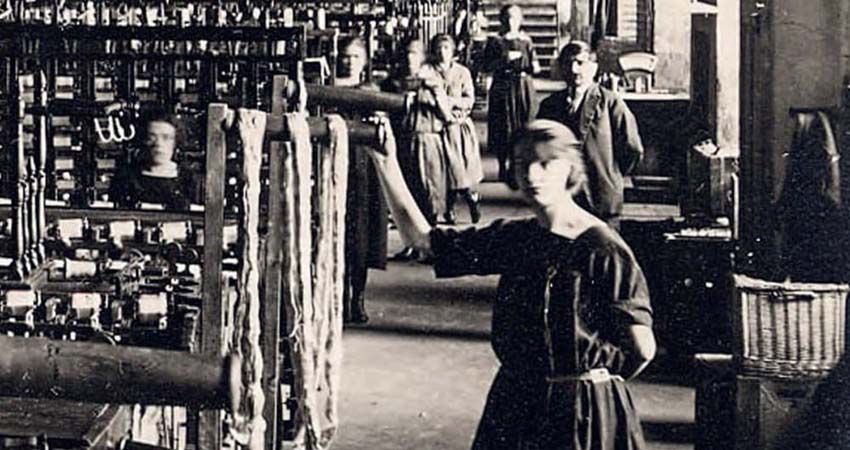 Detail of the book cover. People in a silk factory