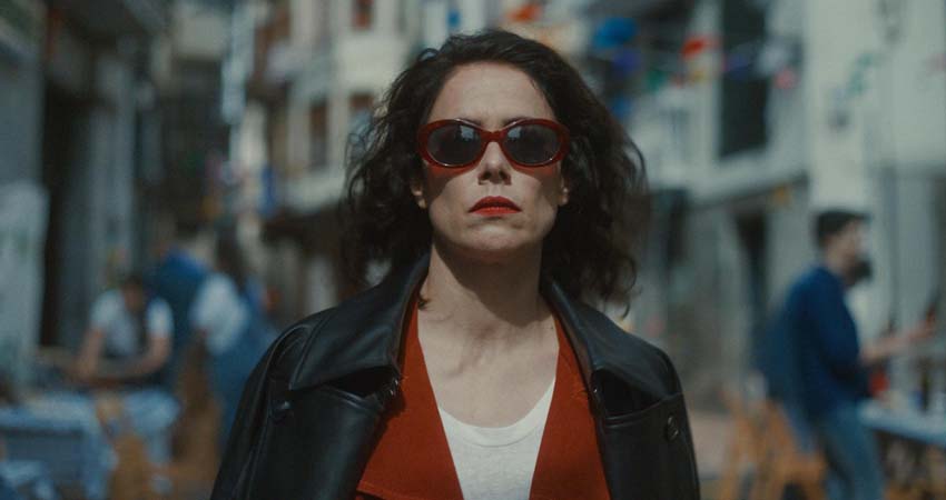 A woman in the middle of the street