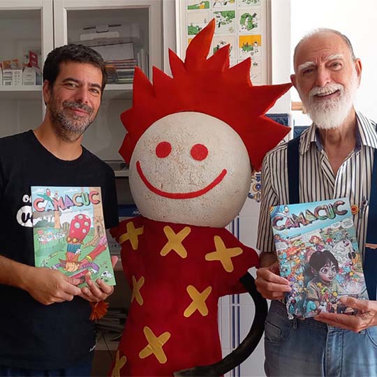 Dos home i al mig un ninot