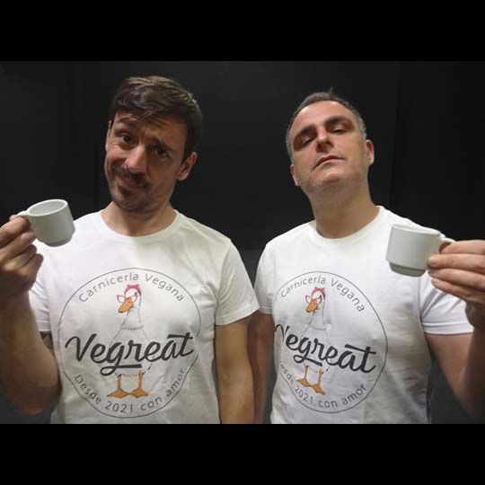 Two men with a cup of coffee