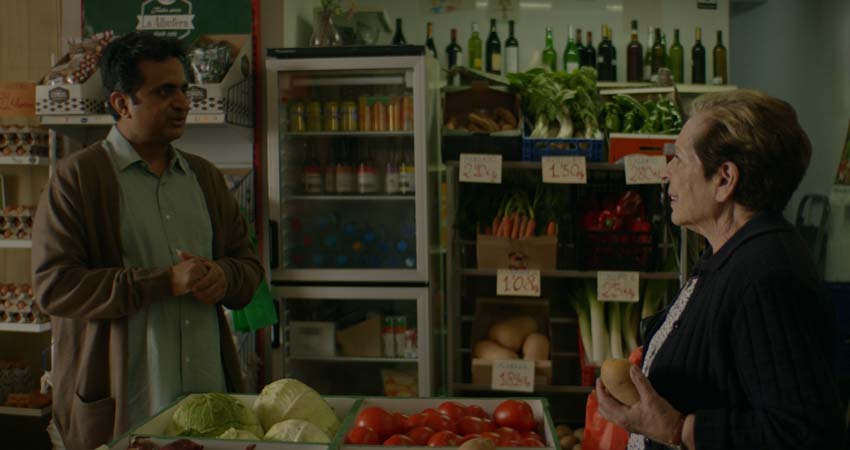 Frame. A woman and a man in a store