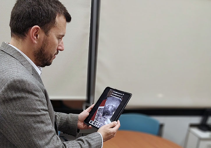 Pedro Morillo using a Mixed Reality tool designed by the UV