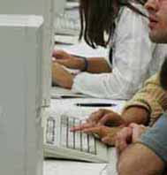 File image of students with computers.