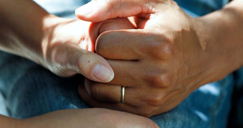 Two hands holding