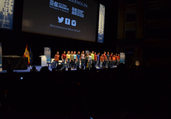 The audience stands to celebrate the performance of Erasmus Valencia Scene at the Teatro Real de Madrid.
