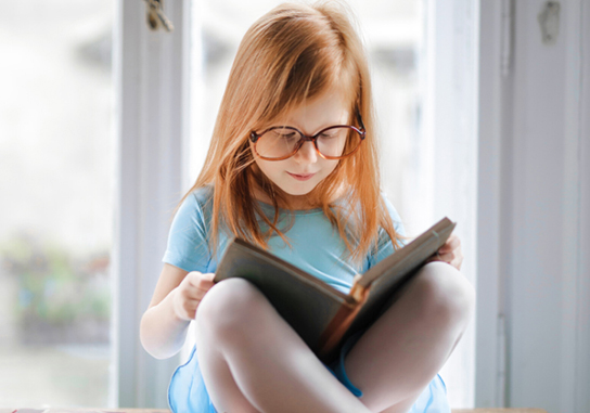 A photo of a girl reading