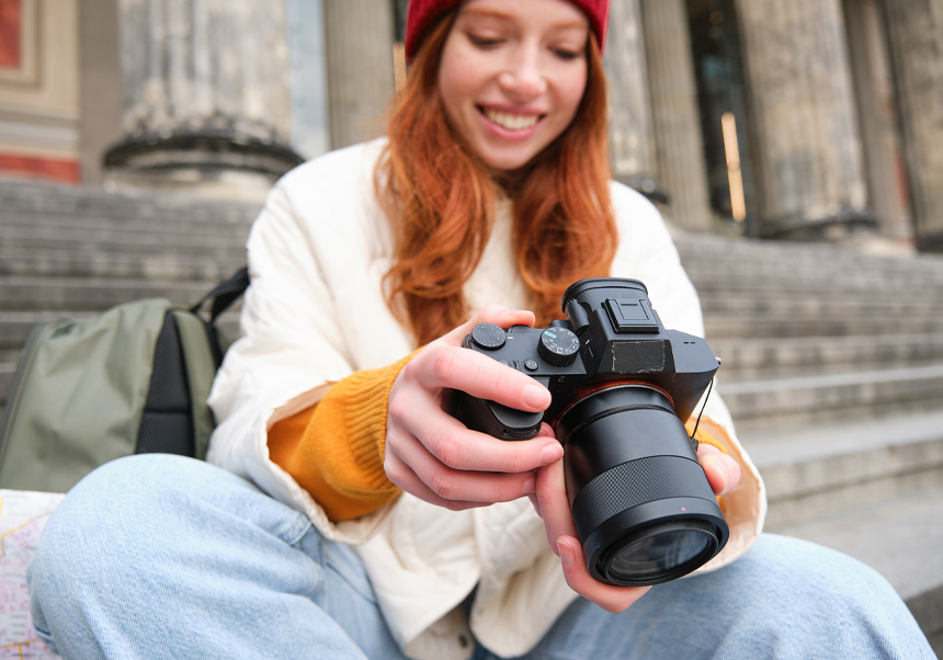 Young woman with a camera.