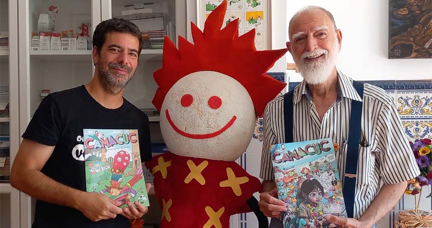 Dos hombre y en medio un muñeco
