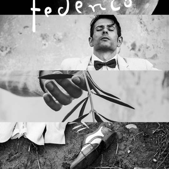 A person's face, a hand with a branch and a shoe on the ground