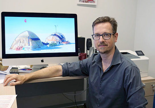 Manuel Porcar with a picture of the Wind Sleigh