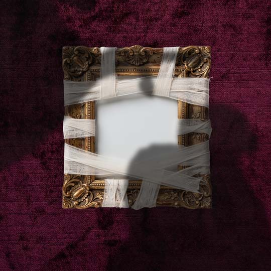 A photo frame with bandages