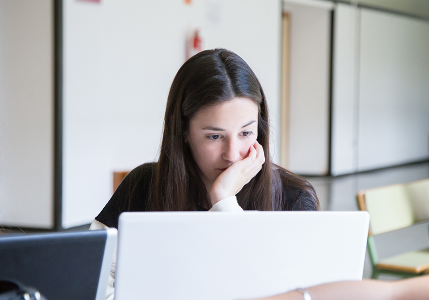 Student working on her laptop