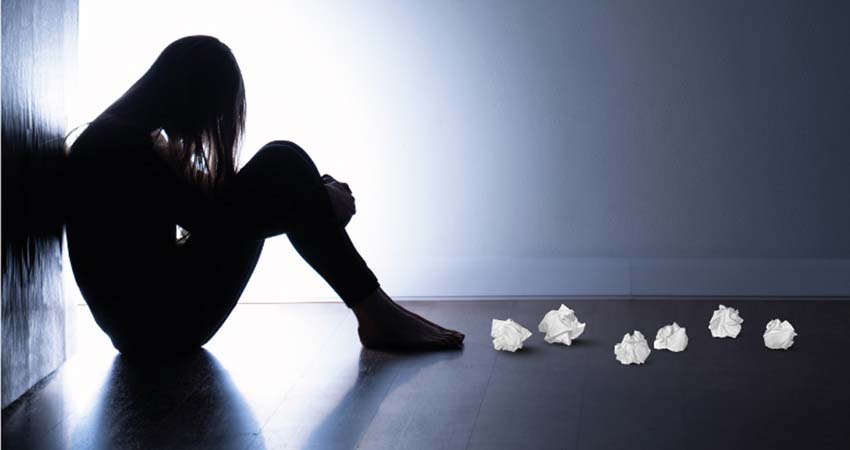 Poster. A girl sitting on the floor