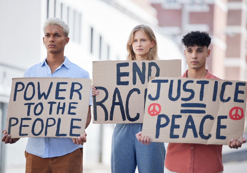 People holding peace signs during a protest