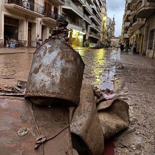 A bell hanging on the ground
