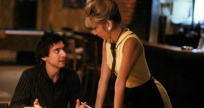 A man and a woman talking