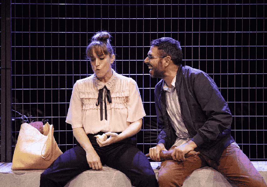 event image:A man and a woman sitting