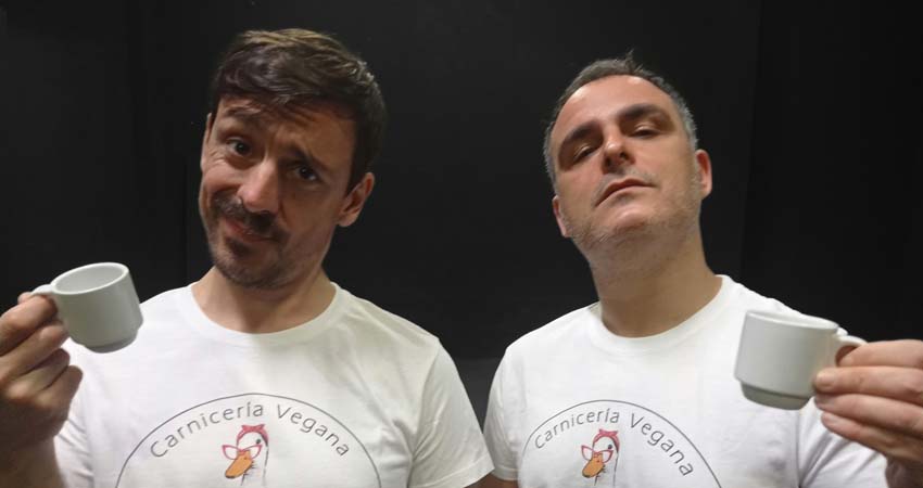Two men with a cup of coffee
