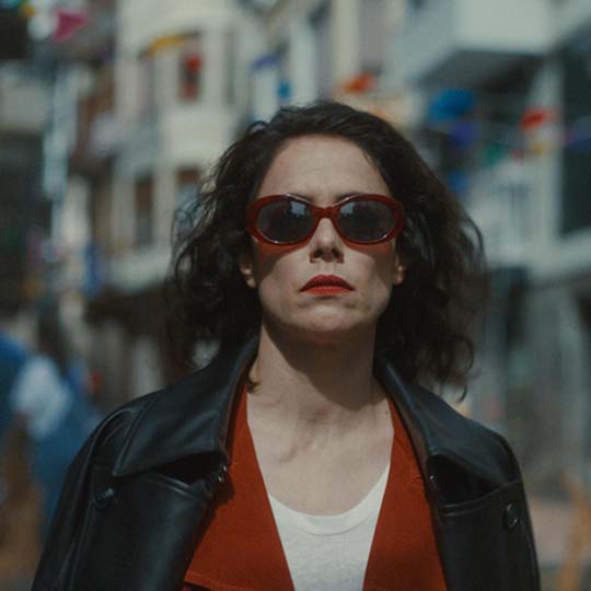 A woman in the middle of the street