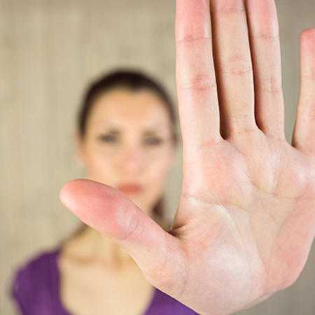 Woman doing the 'stop' gesture