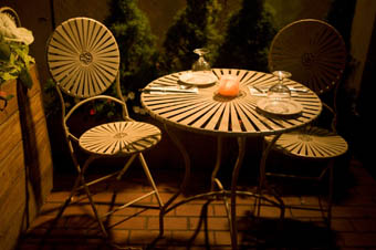 Table and empty chairs, photo by Sandra Sasera.