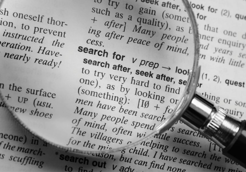 Magnifying glass over a magazine