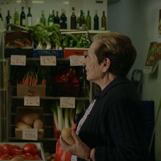 Frame. A woman and a man in a store