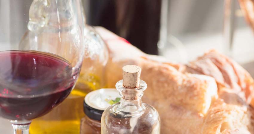 Photo of wine bottle, oil bottle, wine glass