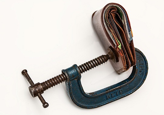 Image of a tool pressing a wallet