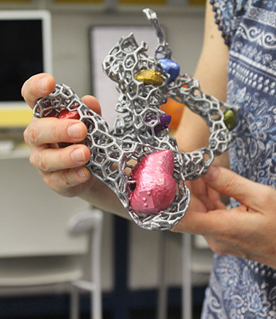 Amelia Ortiz showcases 3D model of the cosmic web adapted and with a legend  in braille