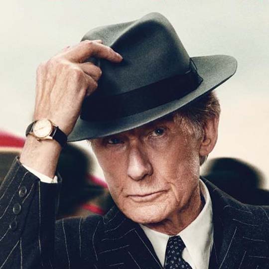 Poster detail. A man putting his hand on his hat