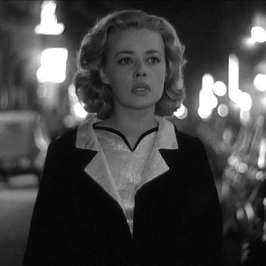 A woman in the middle of the street