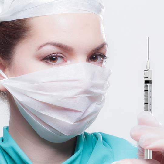 Nurse with a syringe