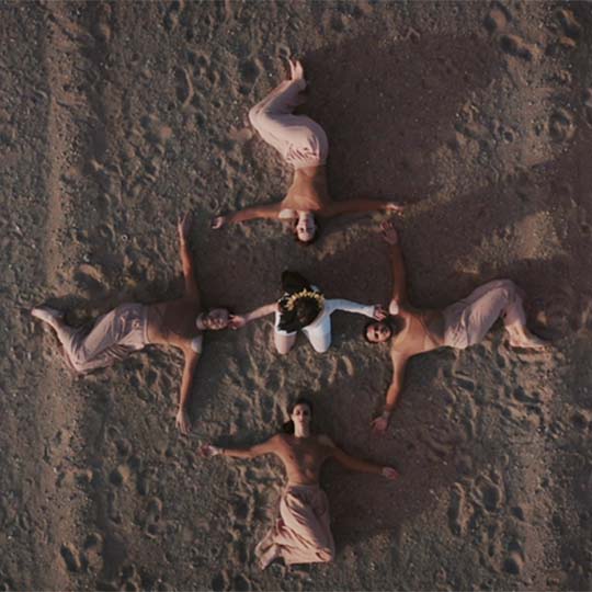 Five people lying on the ground