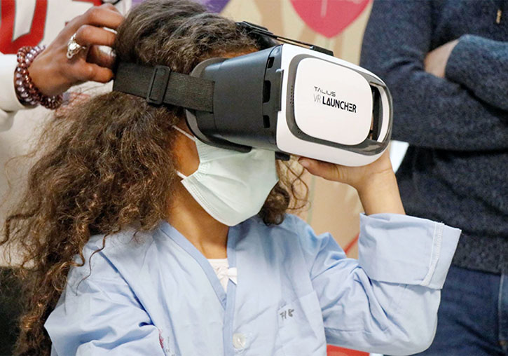 A little girl in the hospital with 3D glasses