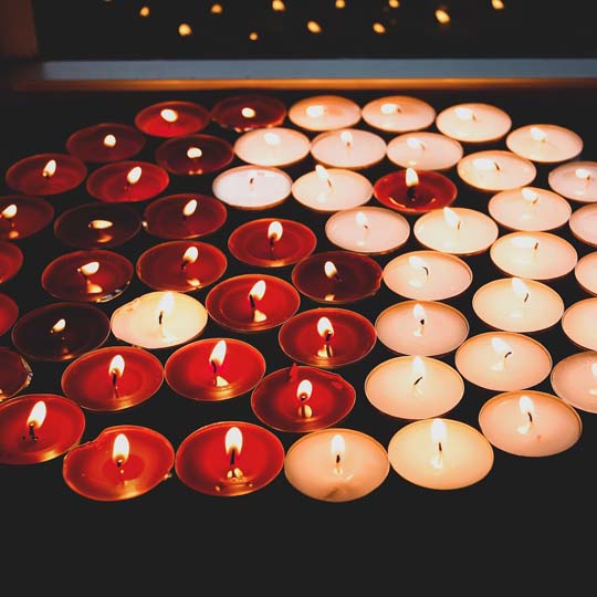 Yin Yang with burning candles