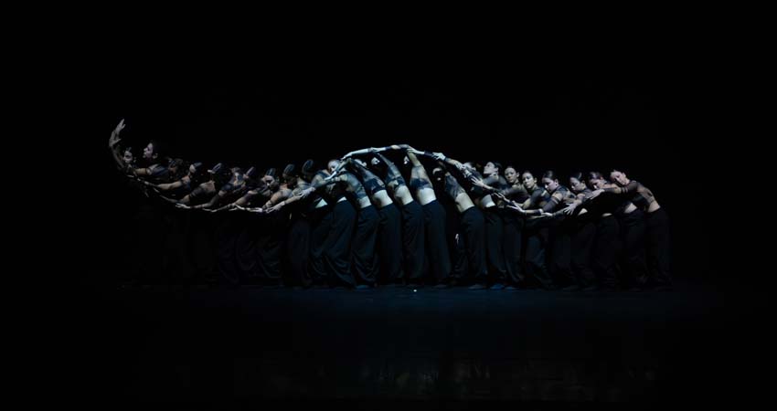 Group of people performing on stage