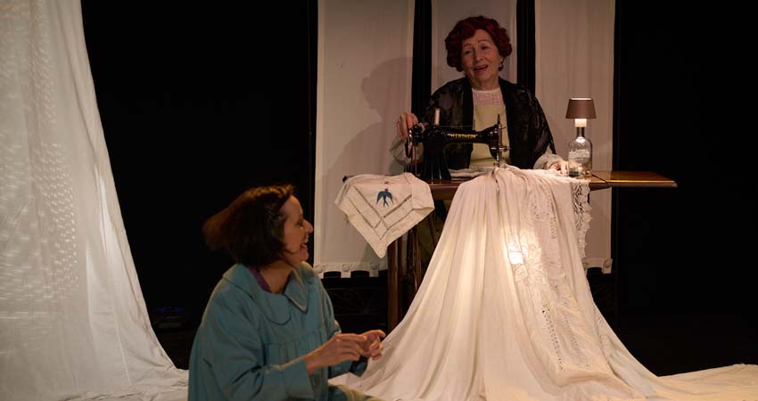 Two women on a stage